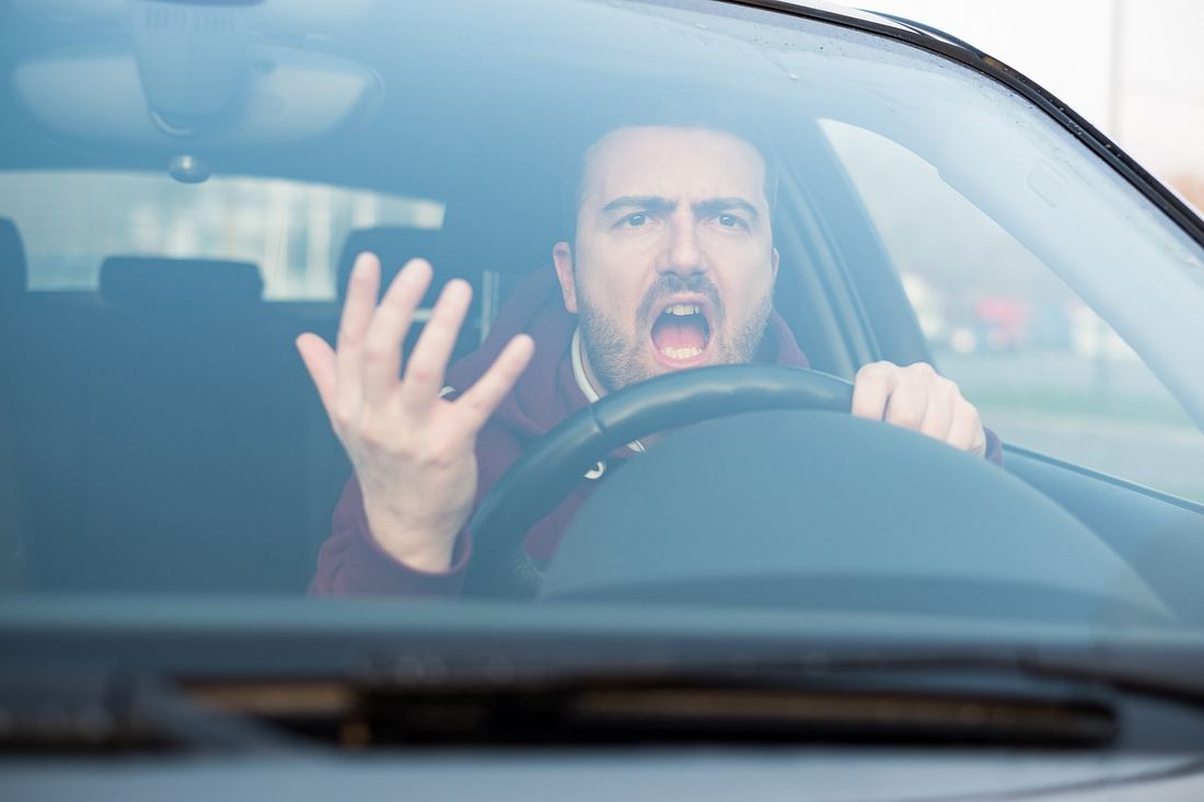 Aggressiver Autofahrer Aggressiver Autofahrer