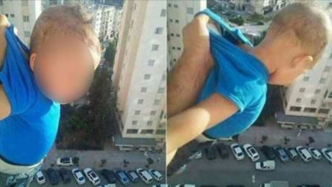Für Likes auf Facebook: Ein Mann hält ein Baby aus einem Fenster eines Hochhauses Weil er Facebook-Likes wollte: Mann hält Baby aus Fenster in 15. Stock