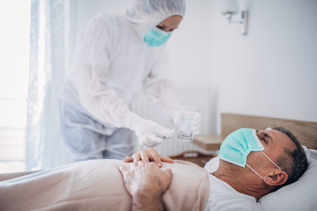 Corona-Patient im Bett Corona-Patient im Bett