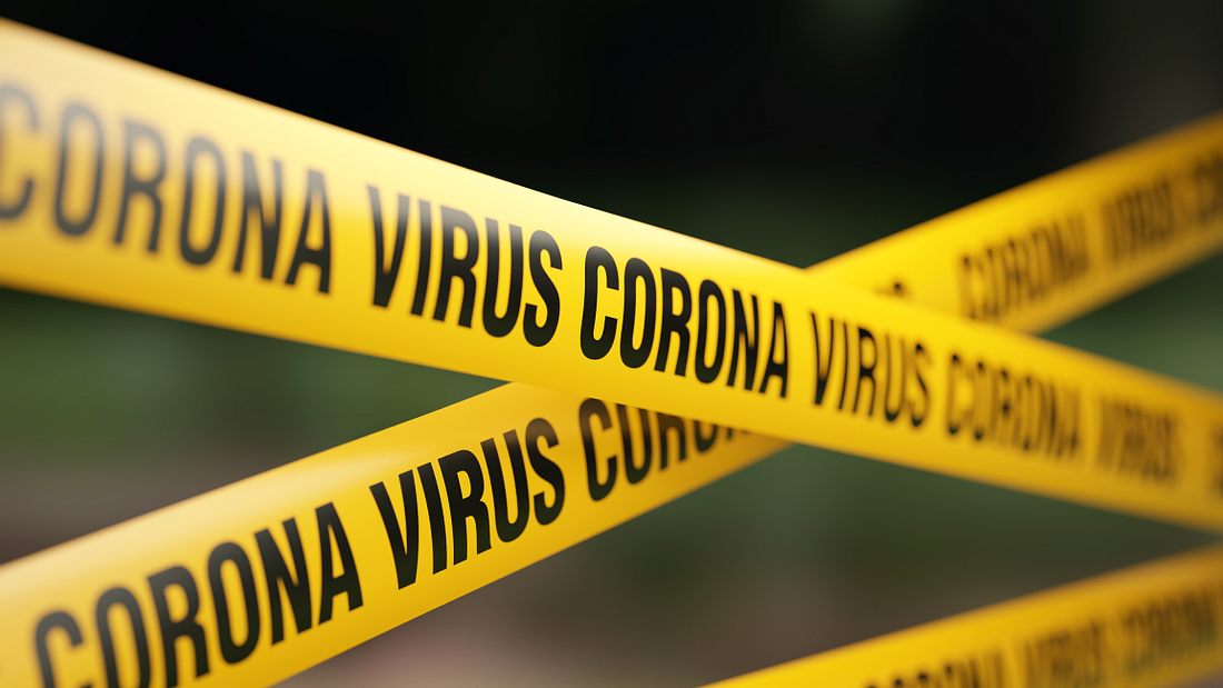 Eilmeldung: Ende der Epidemie nicht vor August Absperrband mit der Aufschrift Corona Virus