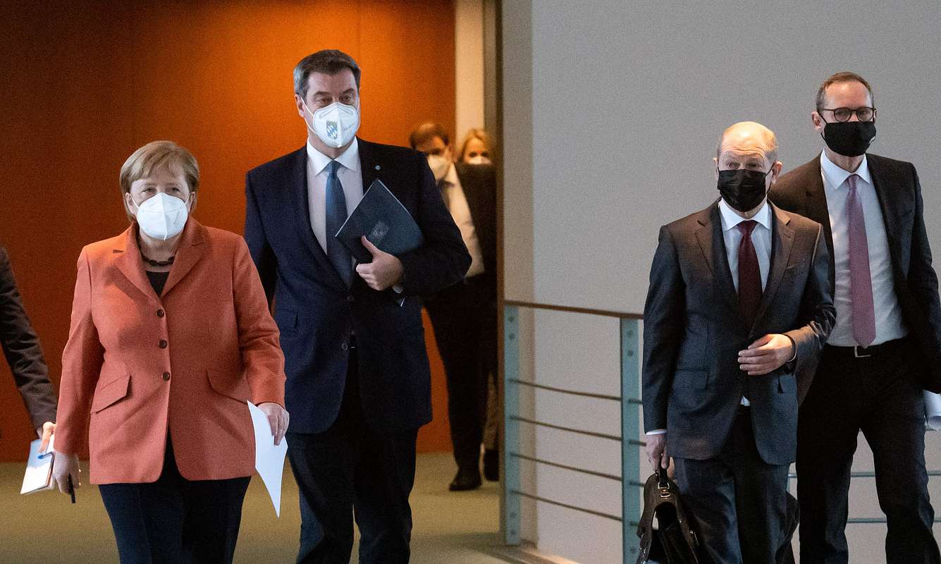 Angela Merkel, Markus Söder, Olaf Scholz