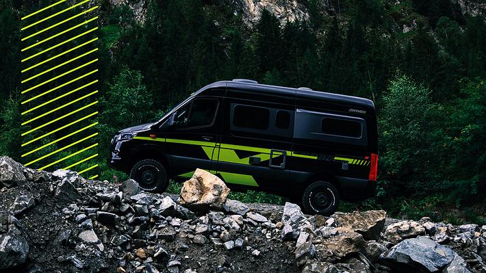 Camper in den Bergen - Foto: getty images / Stuart Ashley, Collage / bearbeitet durch Männersache