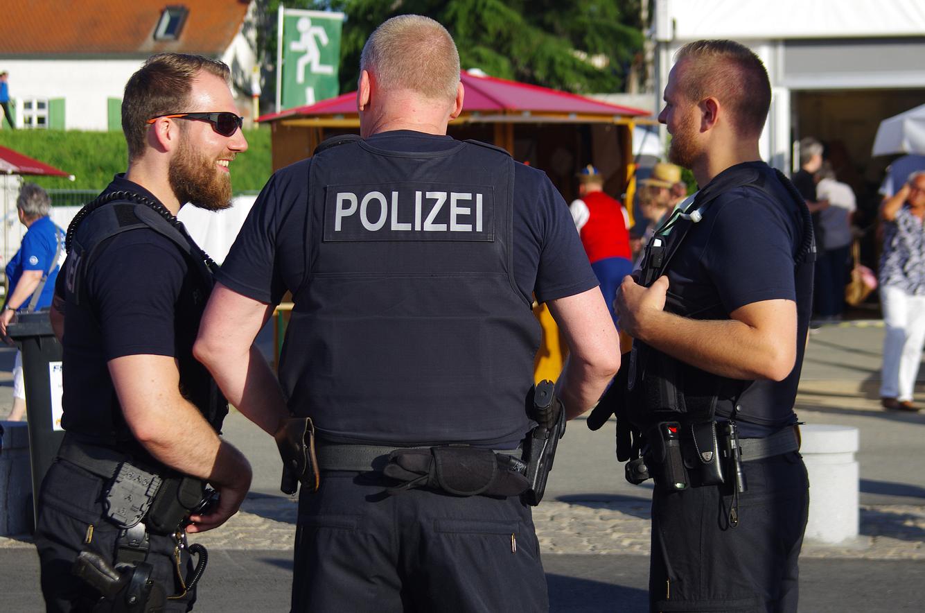 Lachende Polizisten Lachende Polizisten