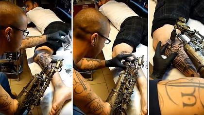 Ink-Roboter: Der Franzose JC Sheitan Tenet tätowiert seine Kunden mit einer Arm-Prothese - Foto: YouTube/ApolonisAphrodisia