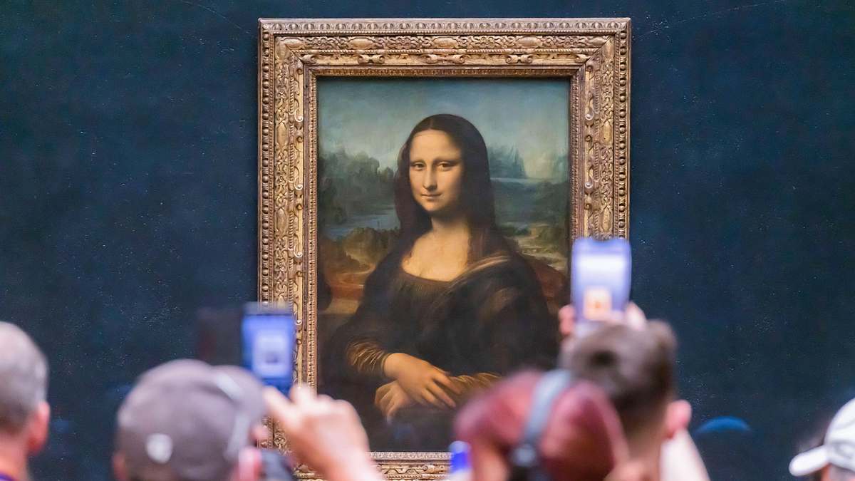 Menschen fotografieren die Mona Lisa