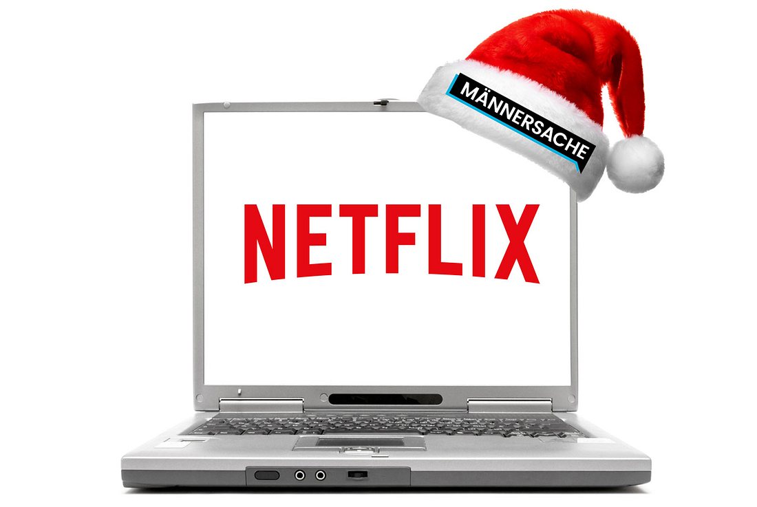 Laptop mit Netflix-Schriftzug und Weihnachtsmütze mit Männersache-Schriftzug