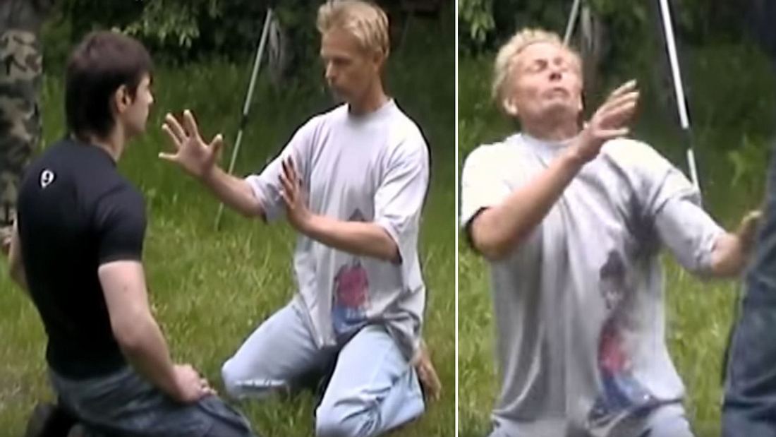 Schutzschild durch Energie? Ein Mann versucht, die Schläge von MMA-Fighter Alexandr Litvinenko abzuwehren Ein Mann versucht die Schläge von MMA-Fighter Alexandr Litvinenko mit der Energie seiner Hände abzuwehren