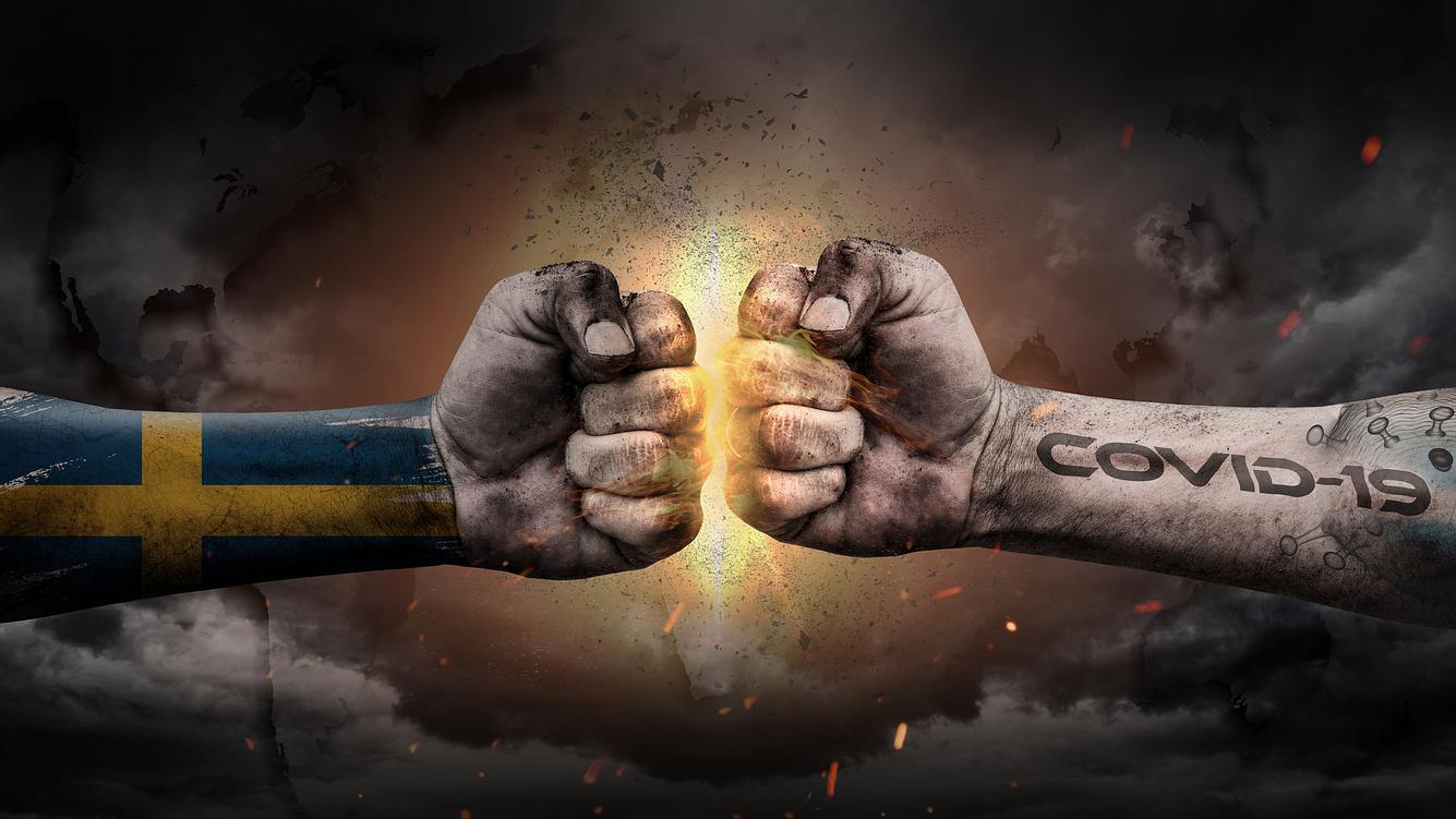 Sonderweg zahlt sich aus: Das sind die Corona-Maßnahmen in Schweden Aufeinanderprallende Fäuste als Symbol für Schwedens Kampf gegen Covid-19