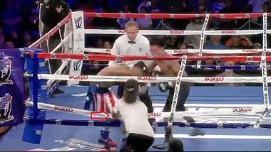 Ein Zuschauer greift einen Boxer per Faustschlag an - Foto: YouTube/NewsWolf